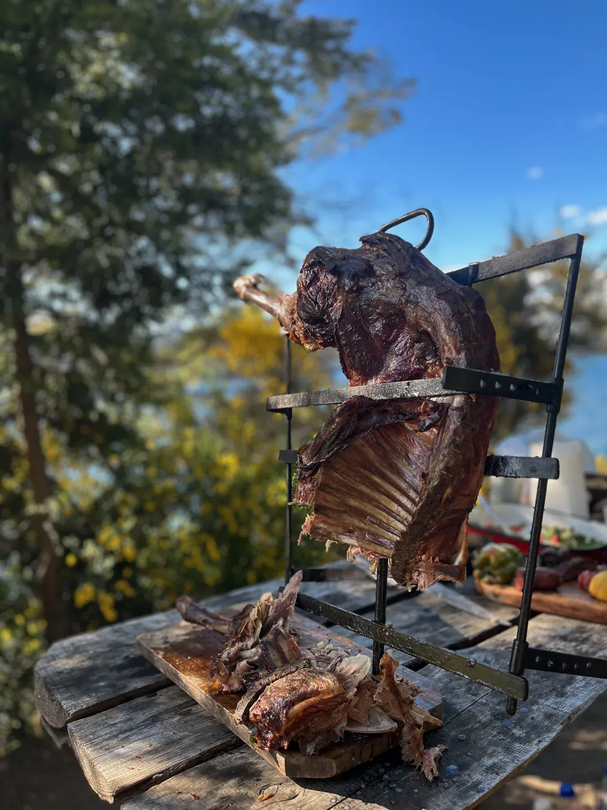 Slow-roasted meat over open fire